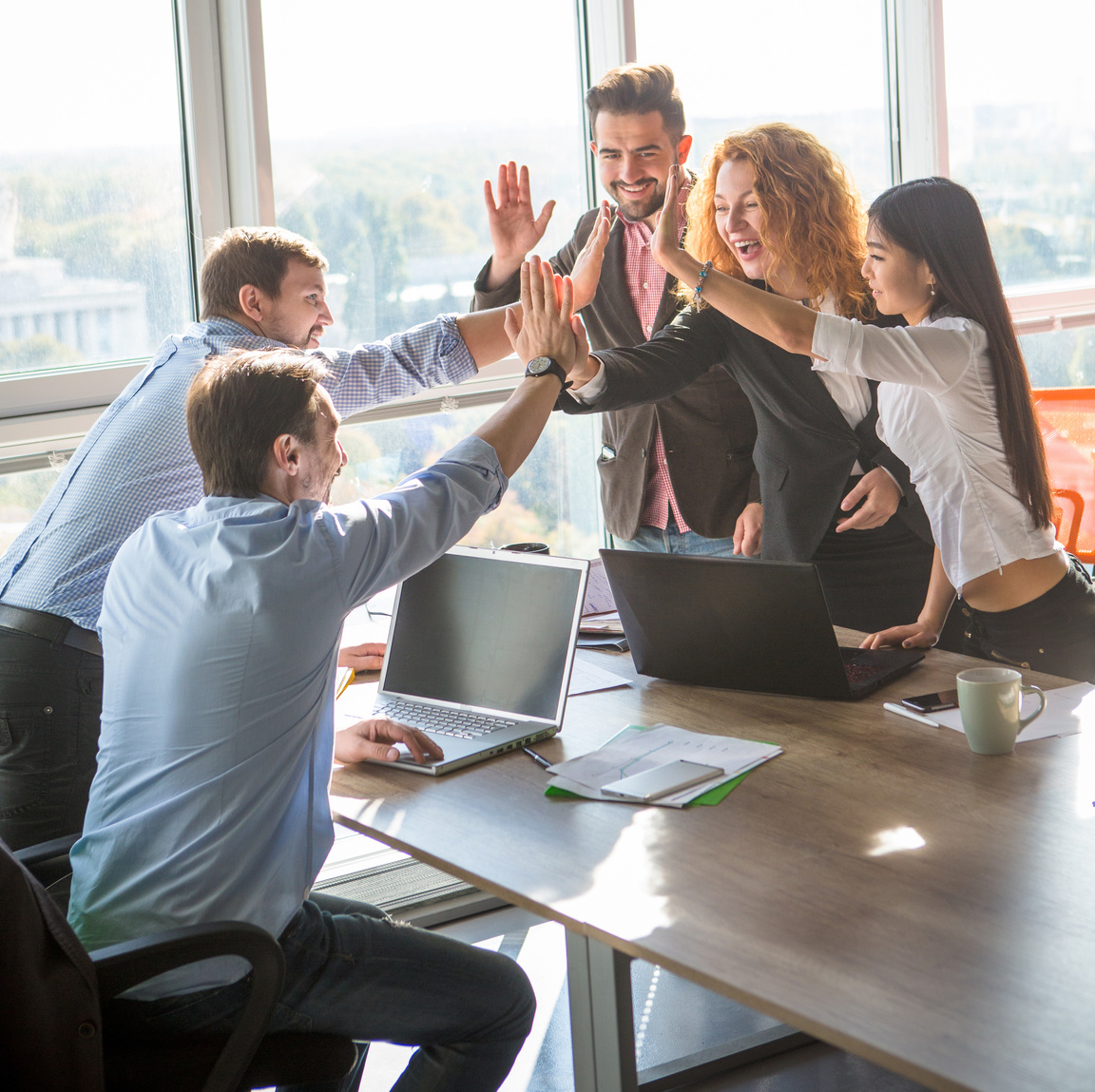 Business people showing team work in office